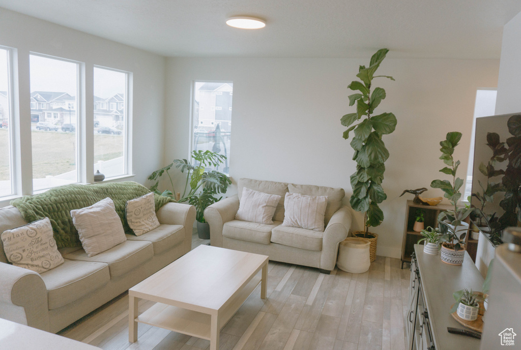 Living area with light wood-style floors