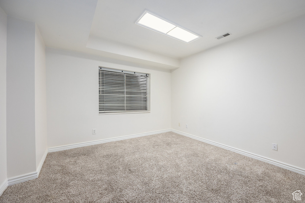 Spare room with carpet flooring and baseboards