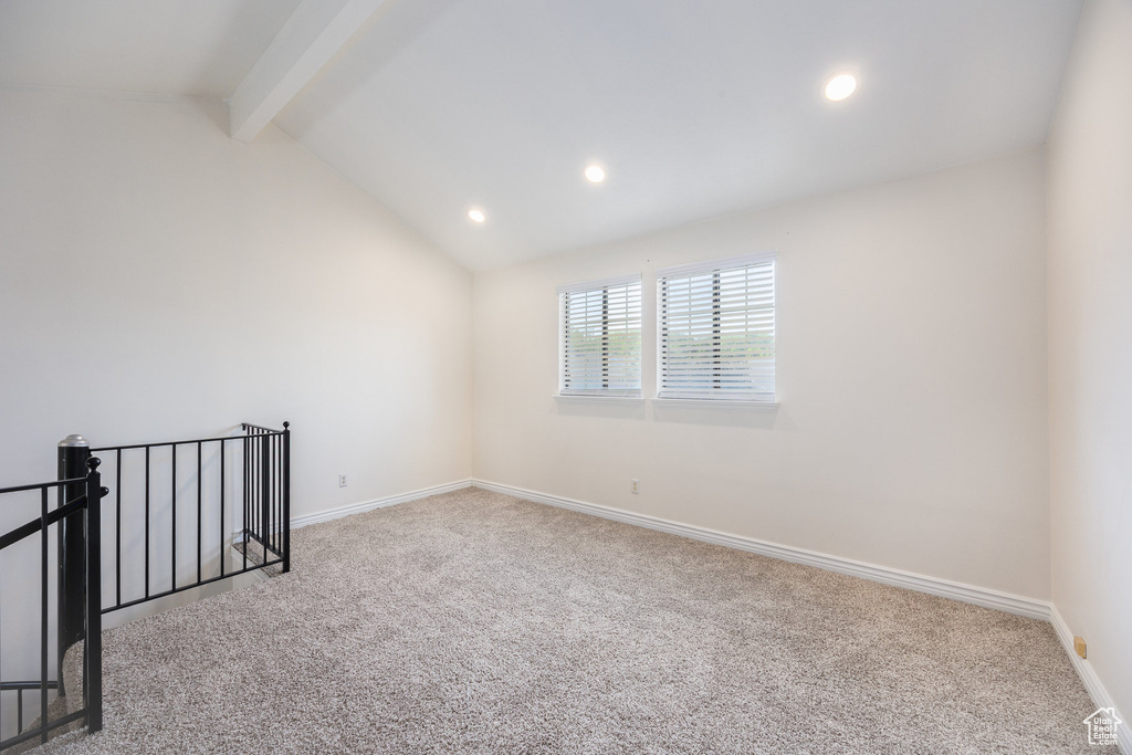 Empty room featuring carpet floors, recessed lighting, and baseboards