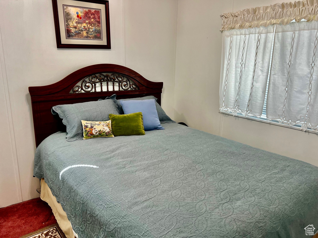 Bedroom with carpet