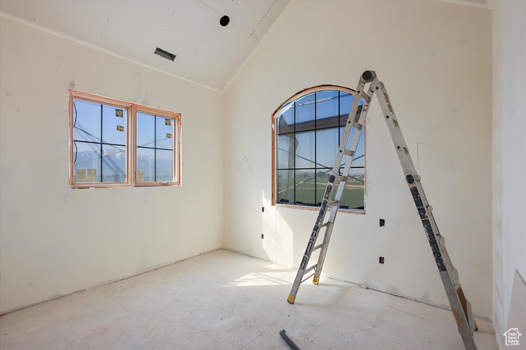 Unfurnished room featuring plenty of natural light