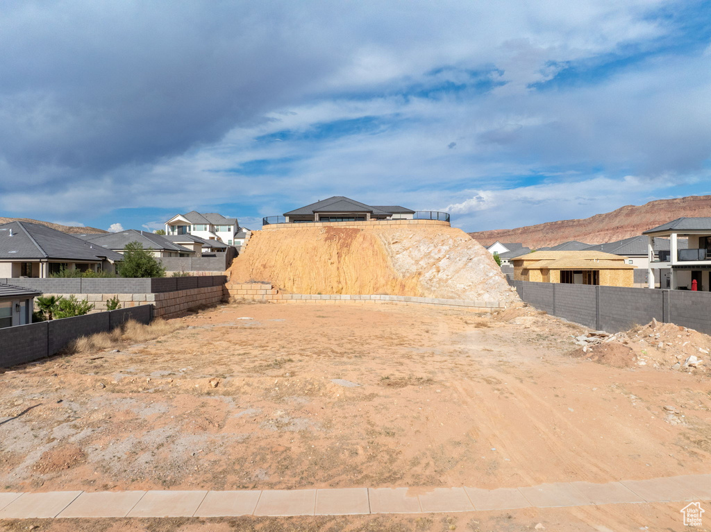 View of yard featuring a residential view and a mountain view