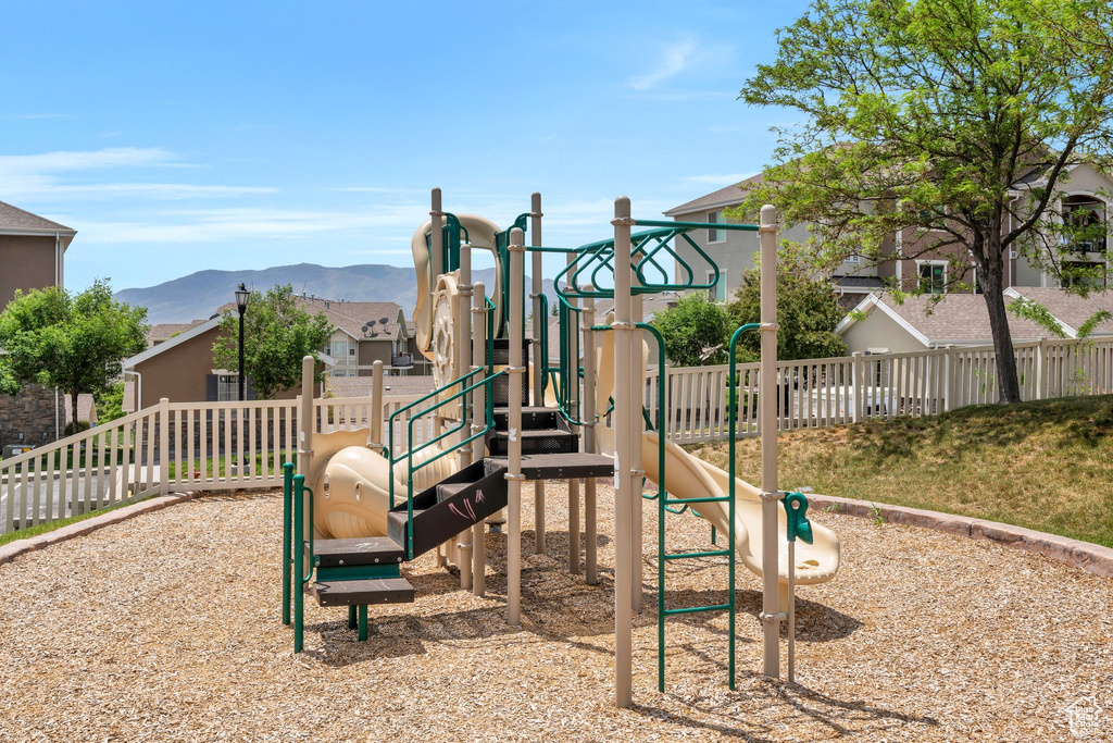 Community jungle gym with a mountain view
