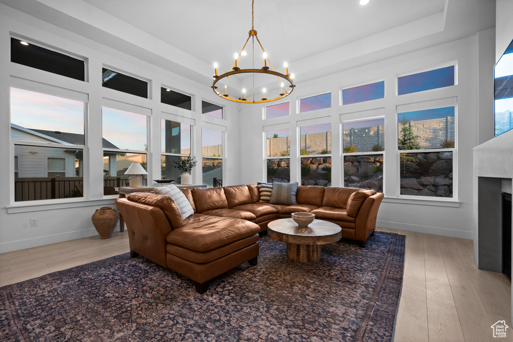 Sunroom with a chandelier