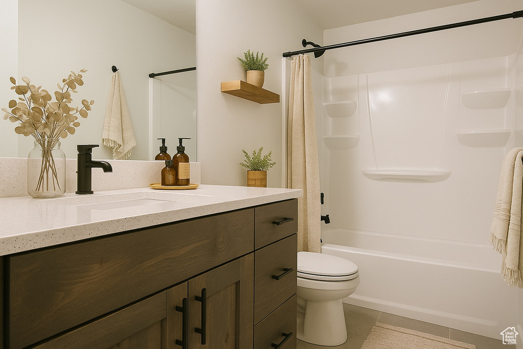 Full bathroom featuring vanity, toilet, shower / tub combo with curtain, and tile patterned floors
