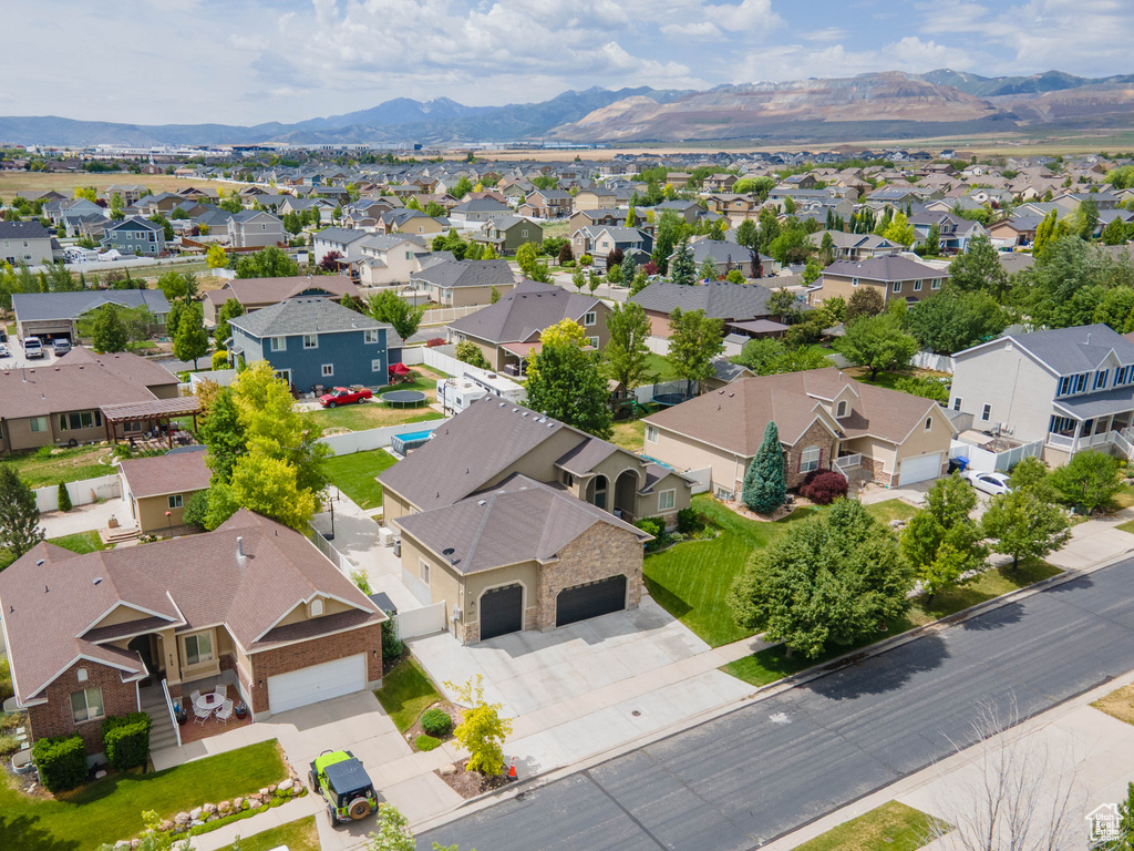 Aerial view of residential area with a mountain backdrop