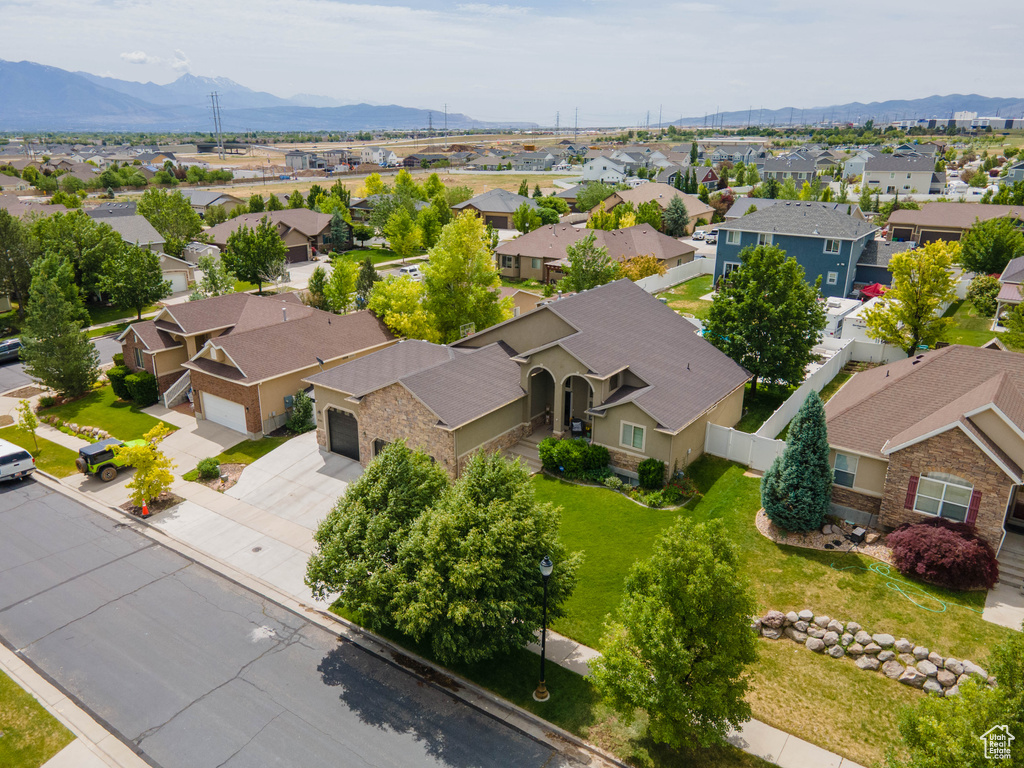 Aerial view of residential area with a mountain backdrop