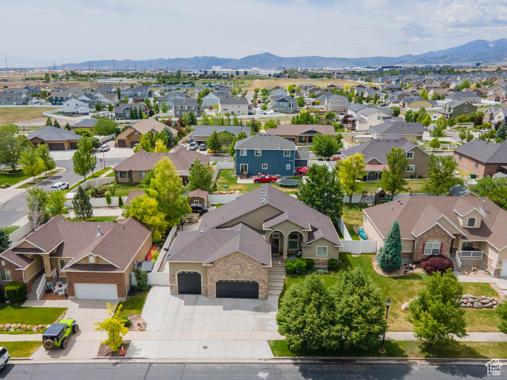 Aerial view of residential area with mountains
