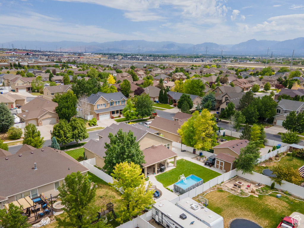 Aerial perspective of suburban area with mountains