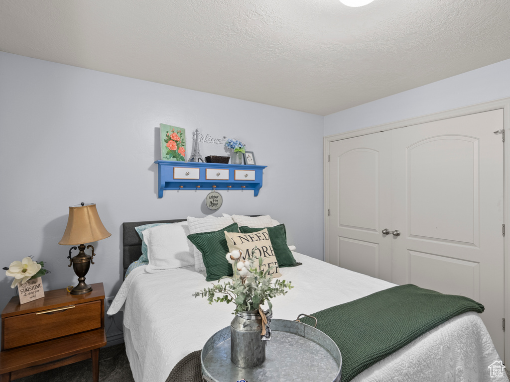 Bedroom featuring a closet