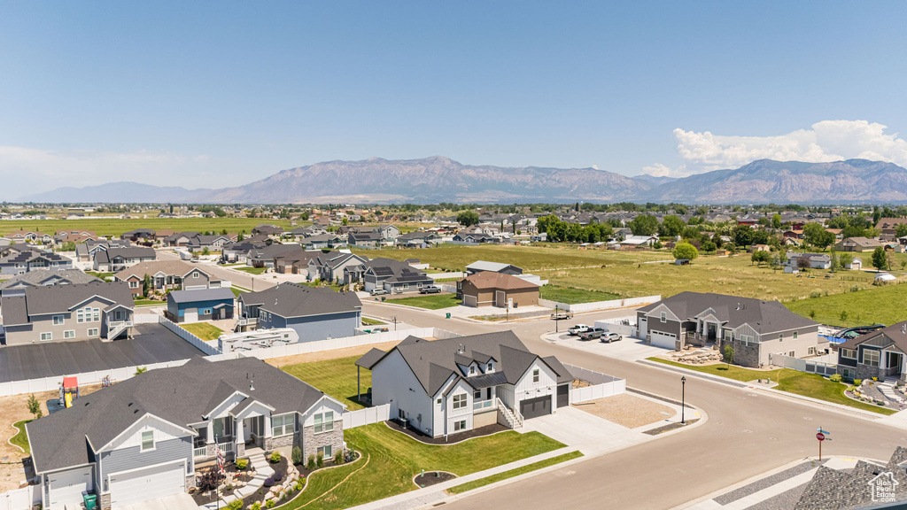Aerial perspective of suburban area featuring mountains