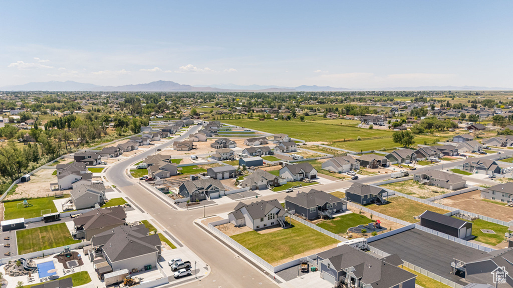 Aerial perspective of suburban area with mountains