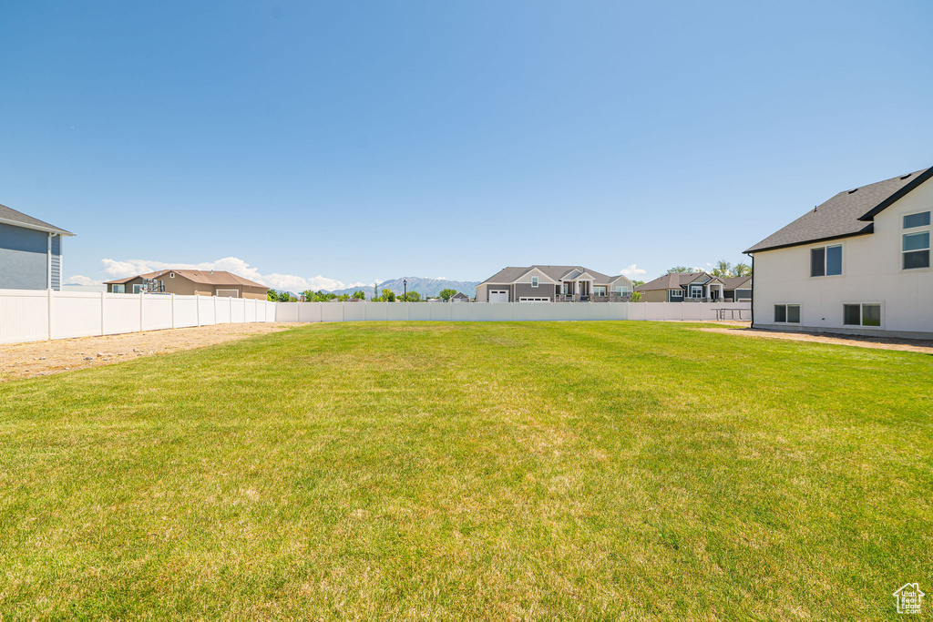 View of yard with a residential view