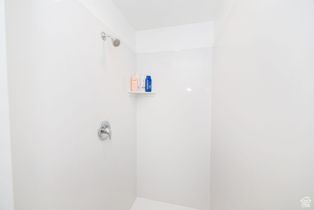 Full bath featuring a shower