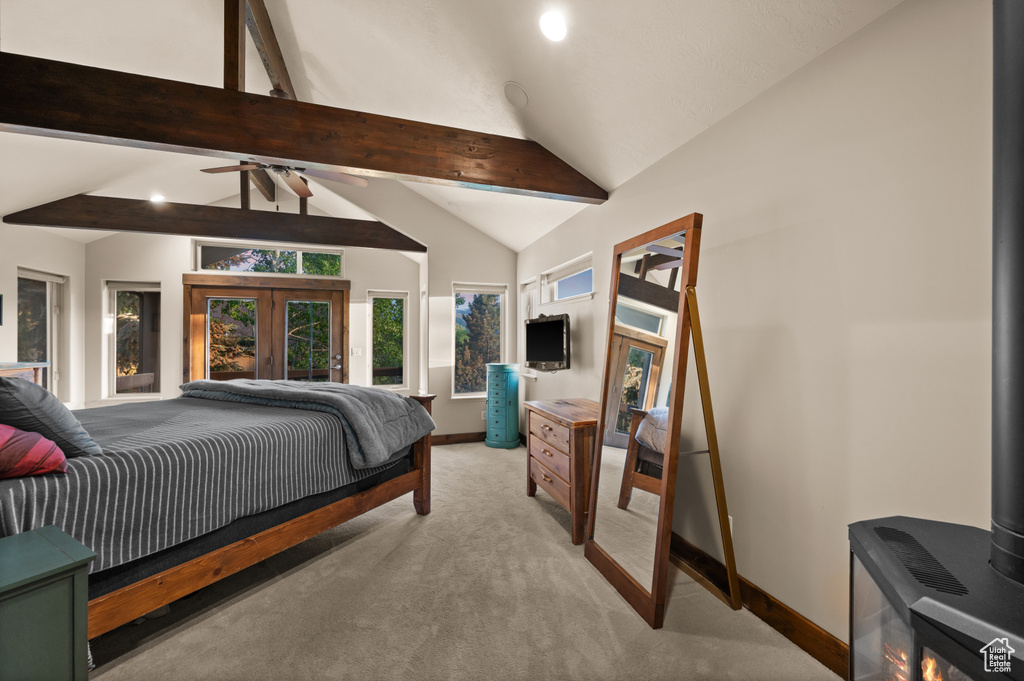 Bedroom with baseboards and light colored carpet
