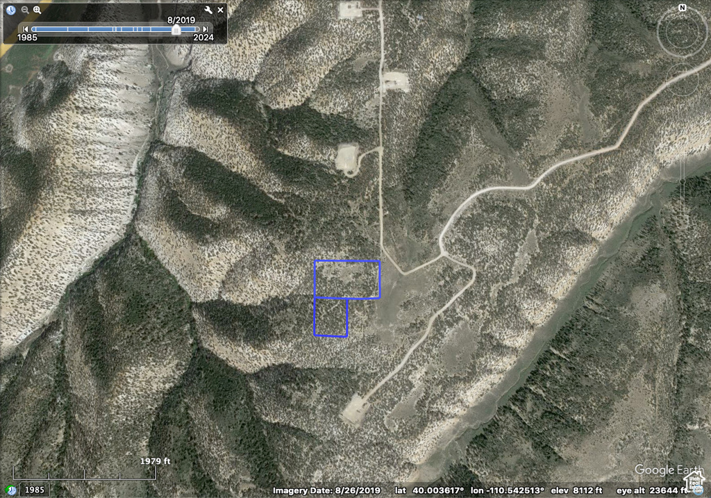 Aerial view of property's location with property parcel outlined