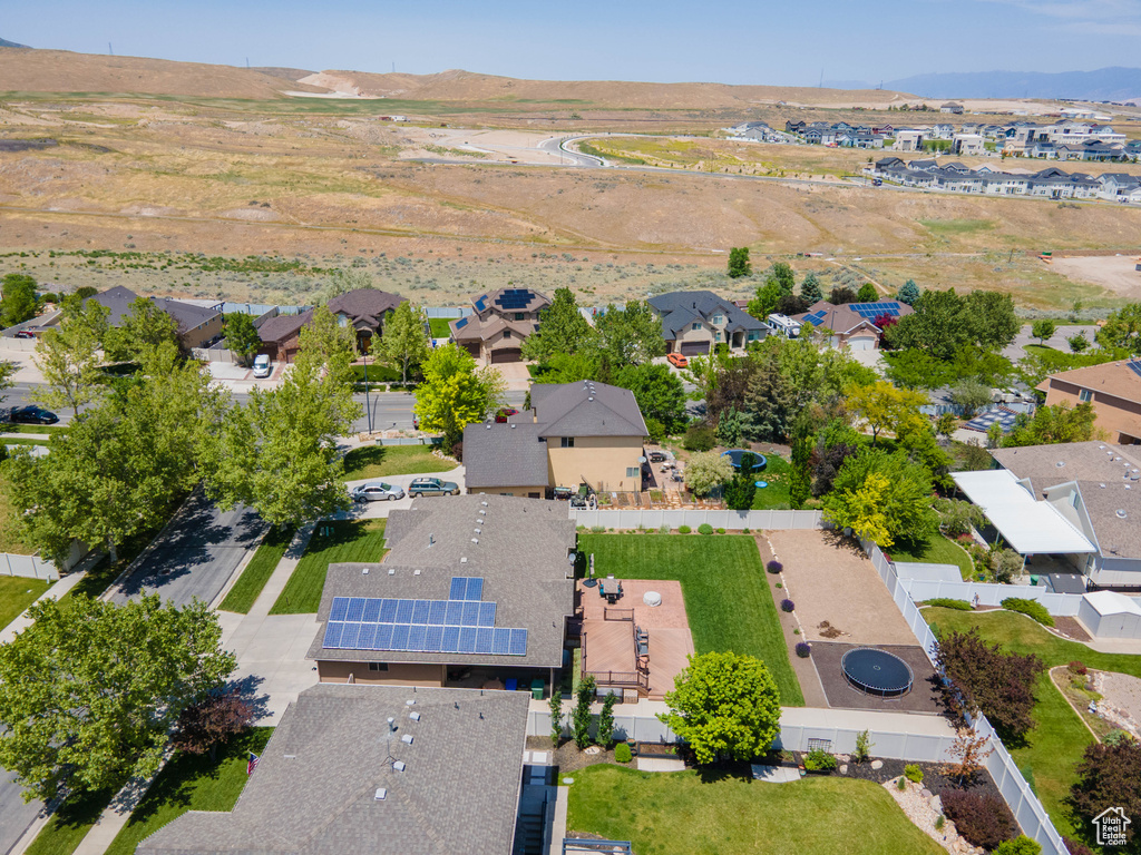 Aerial view of residential area featuring mountains