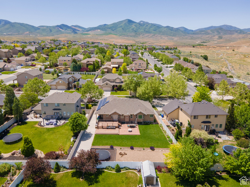 Aerial view of residential area with a mountain backdrop