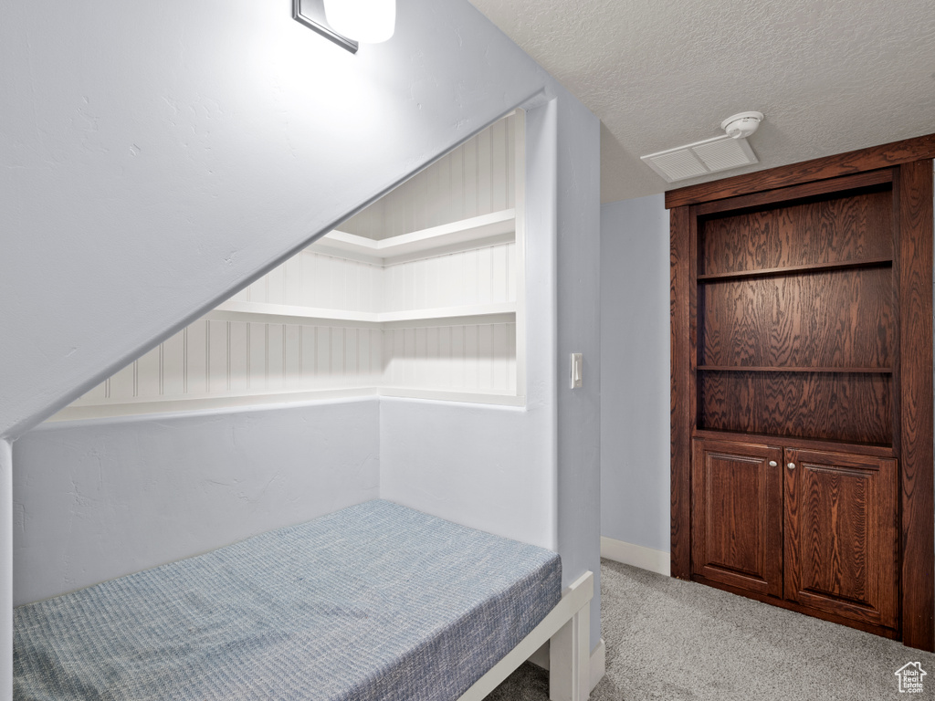 Unfurnished bedroom featuring carpet flooring