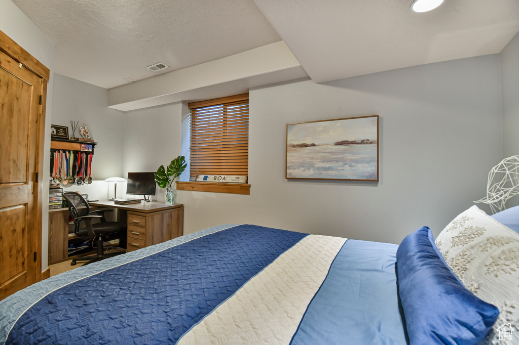 Bedroom featuring a desk
