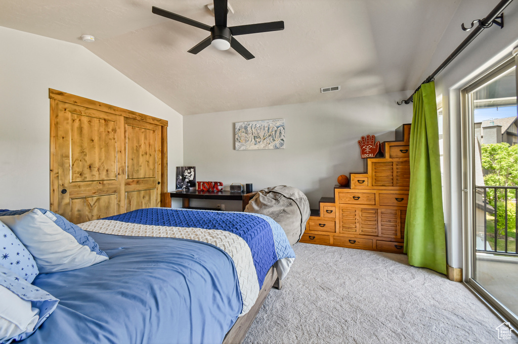 Bedroom with lofted ceiling, carpet, access to exterior, and ceiling fan