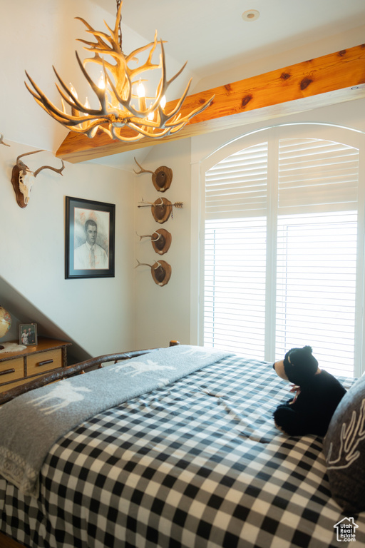 Bedroom with a chandelier