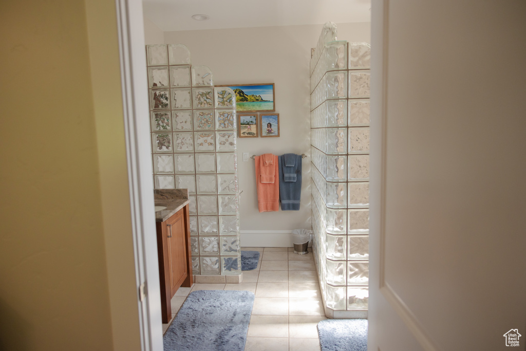Bathroom with vanity and tile patterned flooring