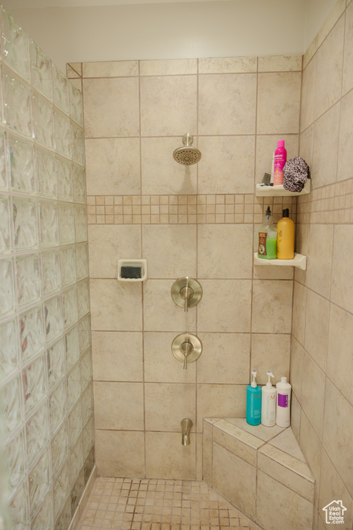 Bathroom with tiled shower