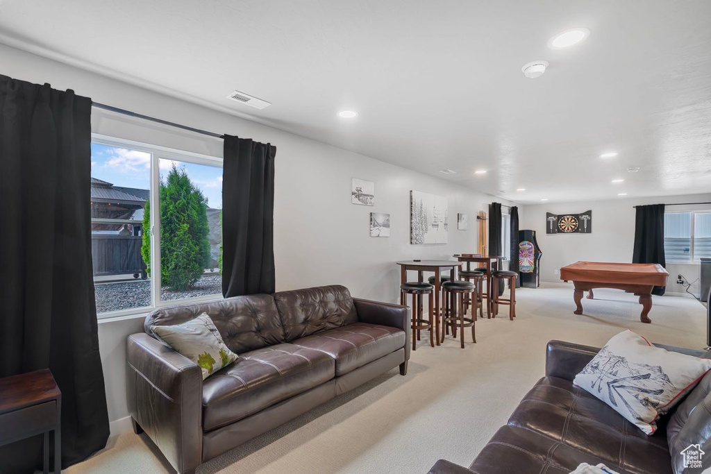 Living area with carpet floors, plenty of natural light, recessed lighting, and billiards