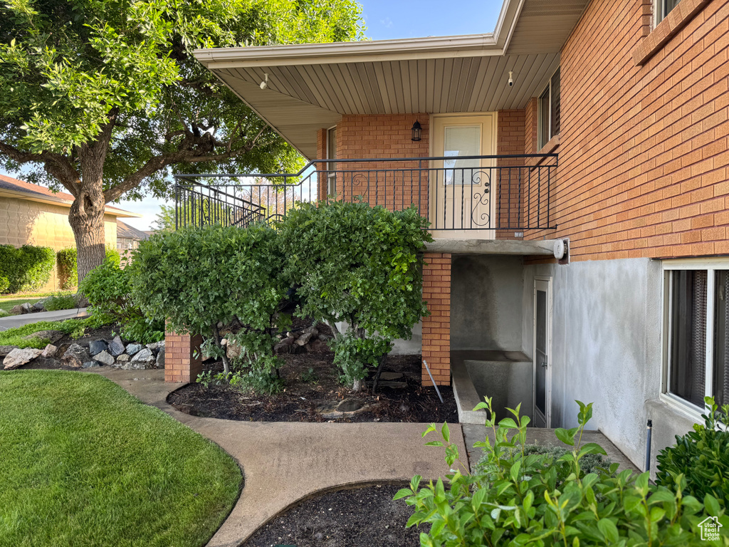 Property entrance with brick siding