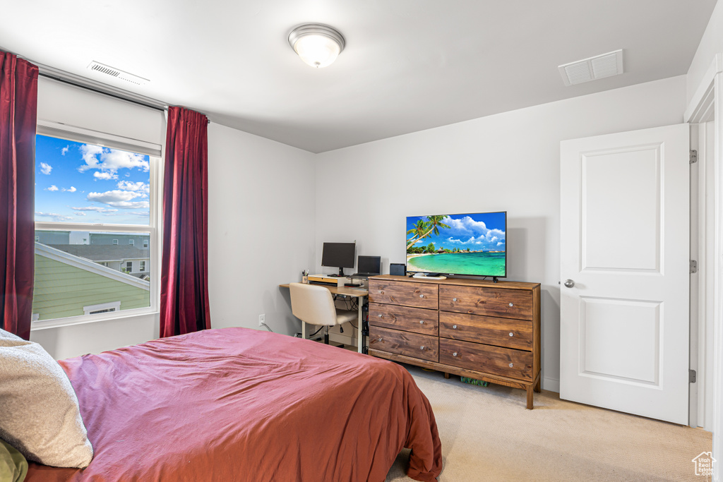 View of carpeted bedroom