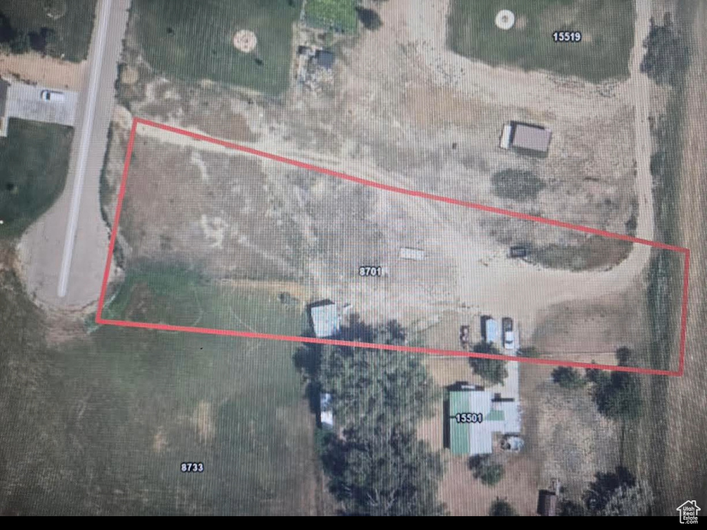Aerial overview of property's location with property parcel outlined