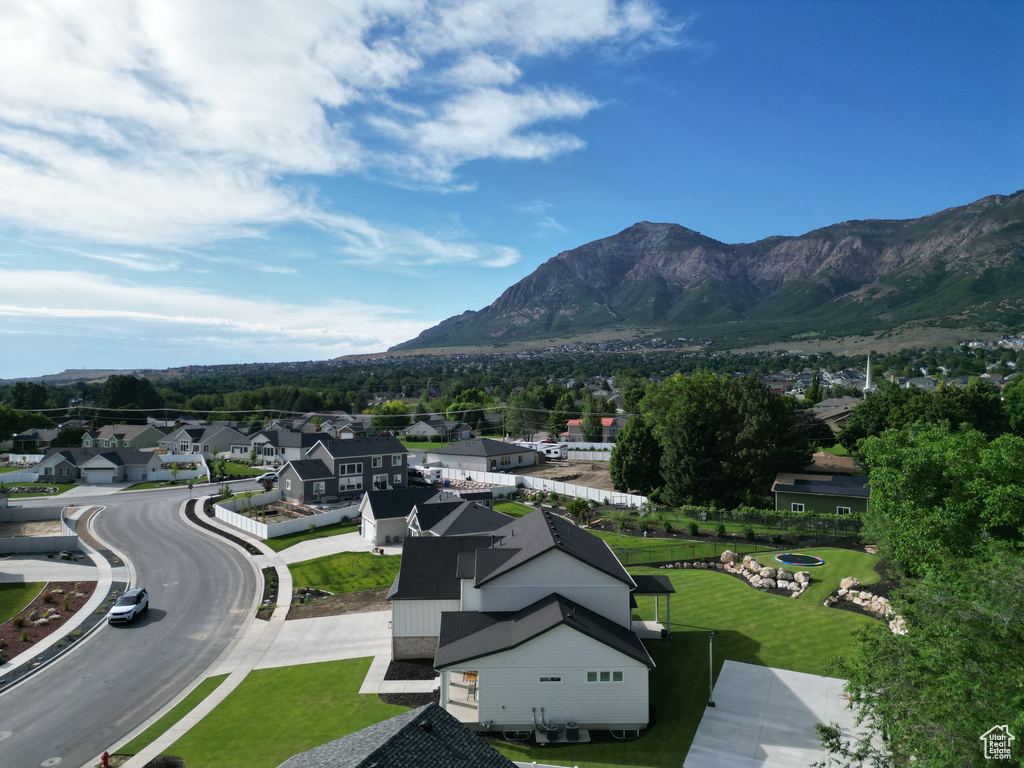 View of mountain background featuring nearby suburban area
