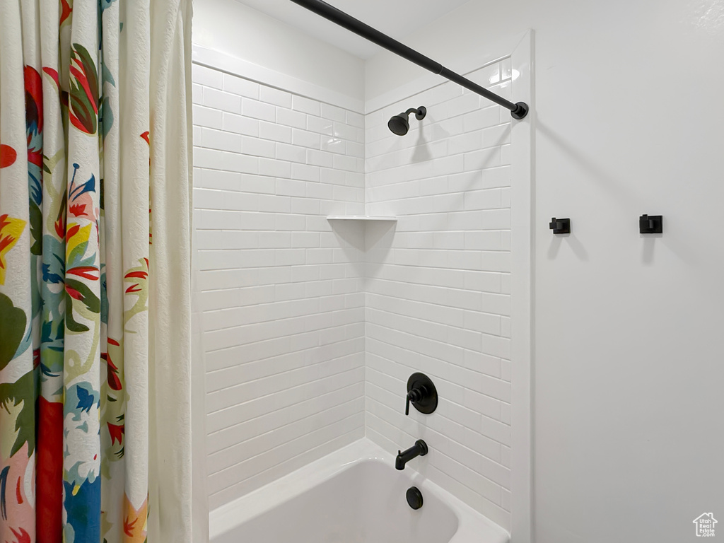 Bathroom featuring shower / tub combo
