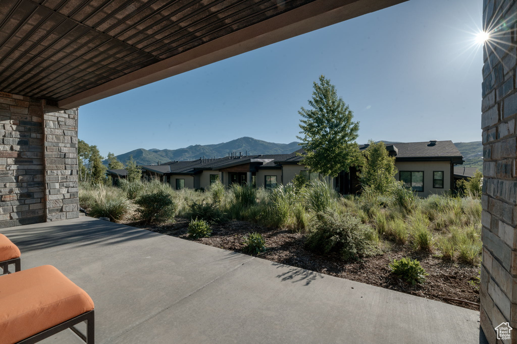 View of patio with a mountain view