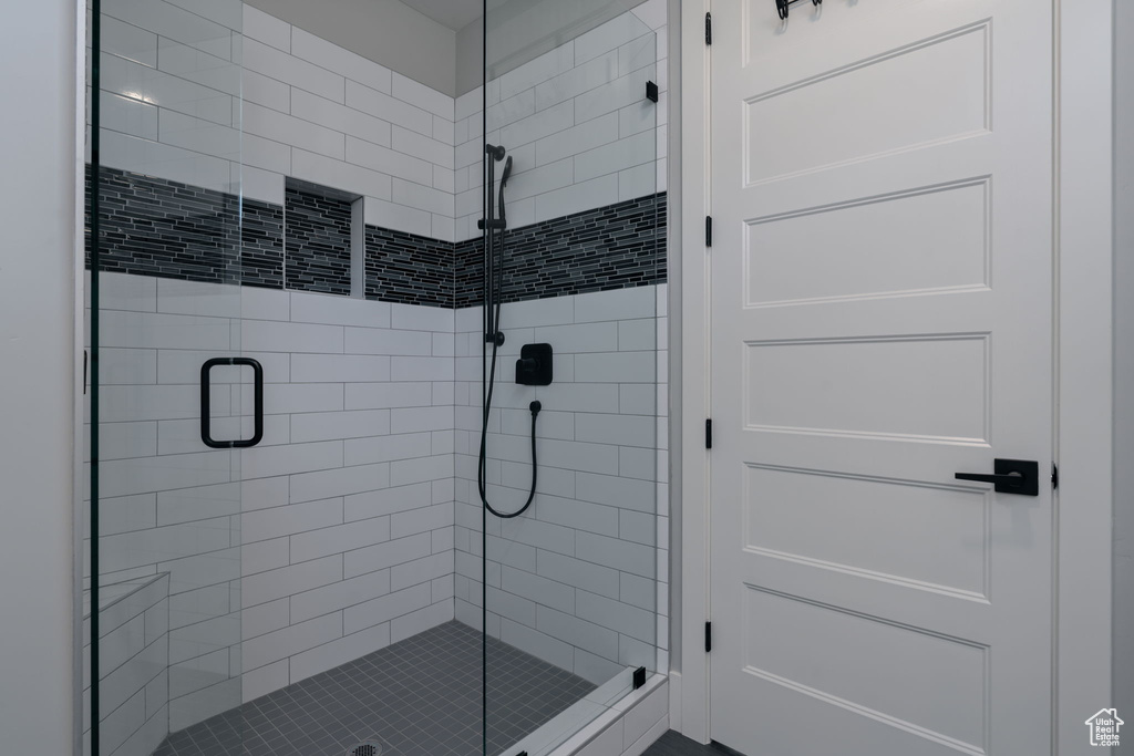 Full bath featuring a stall shower