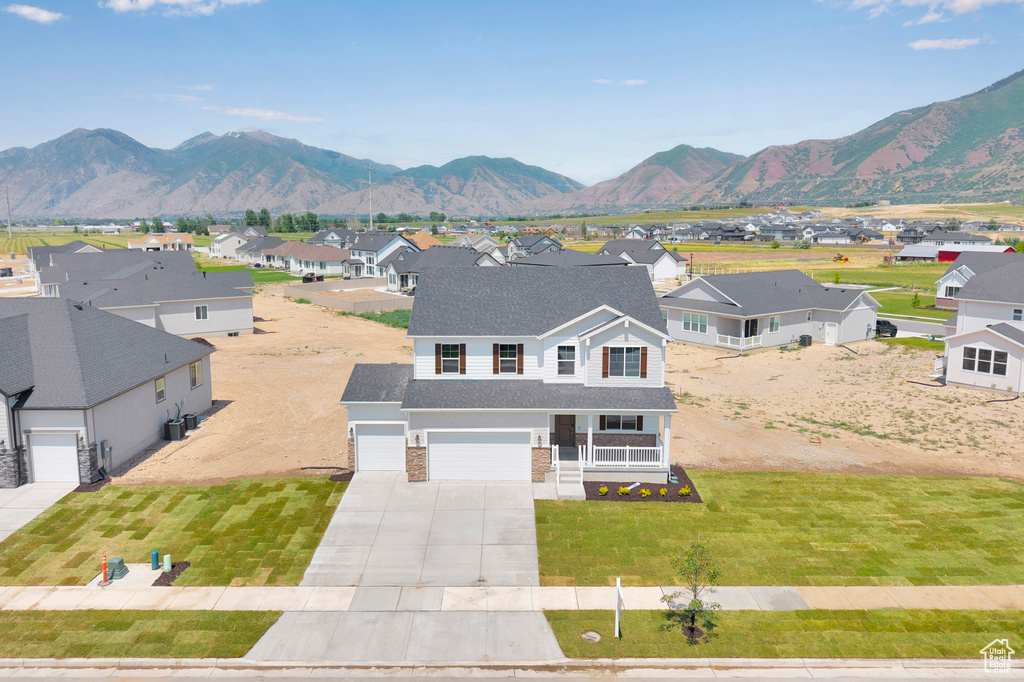 View of mountain backdrop with nearby suburban area