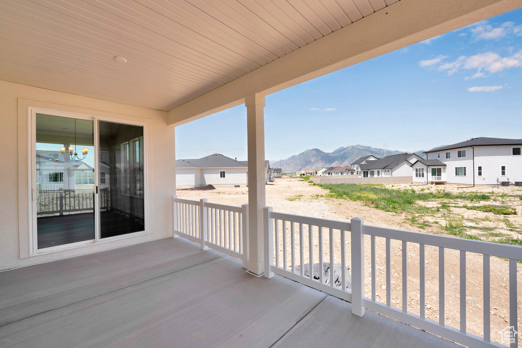Balcony with a mountain view and a residential view