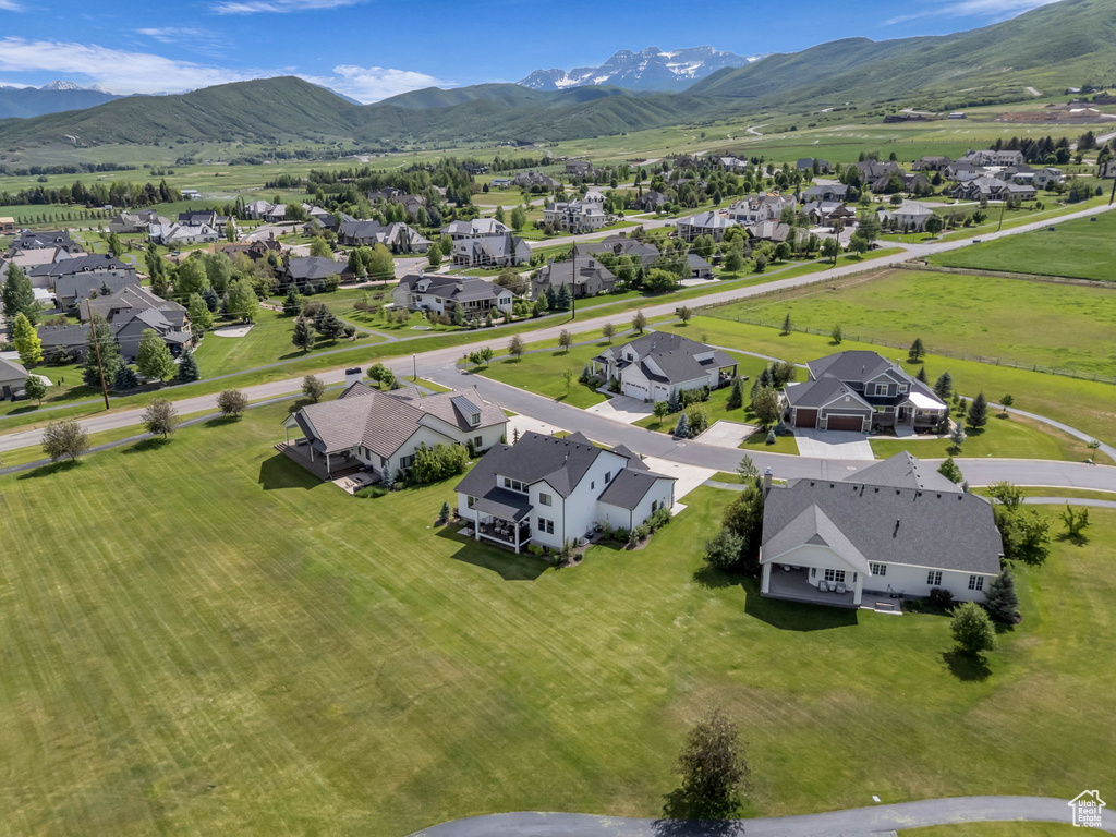 Aerial perspective of suburban area featuring mountains