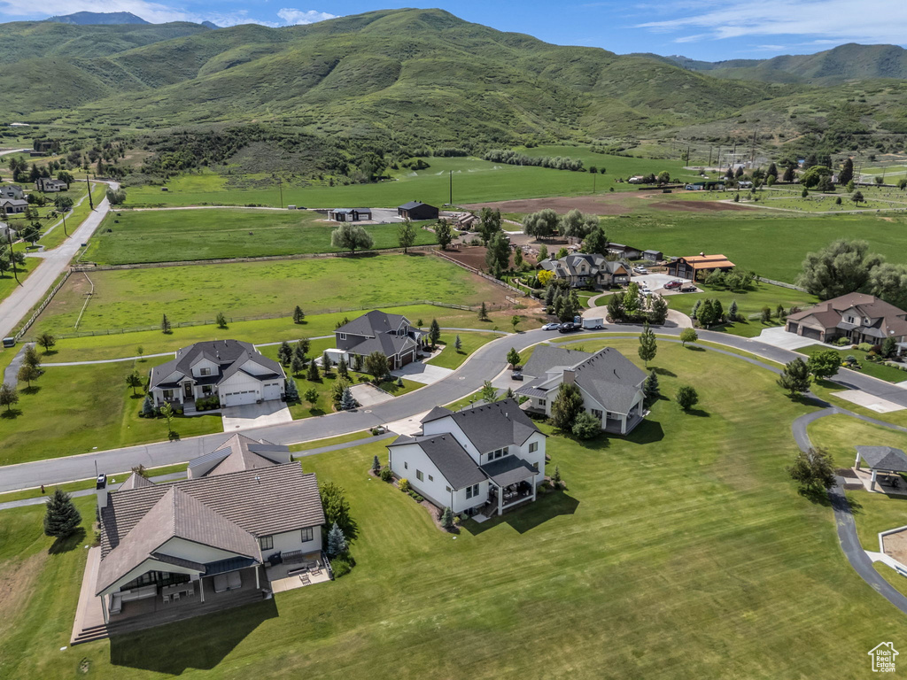 Aerial view of residential area with a mountainous background