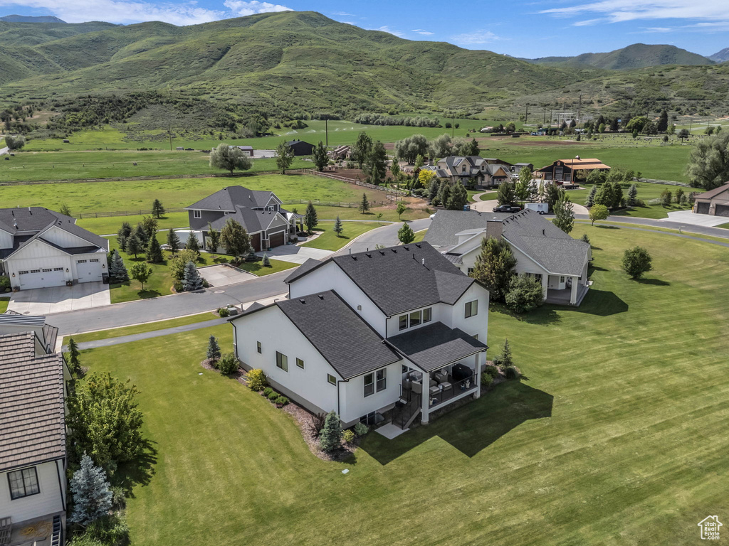 Aerial perspective of suburban area with mountains