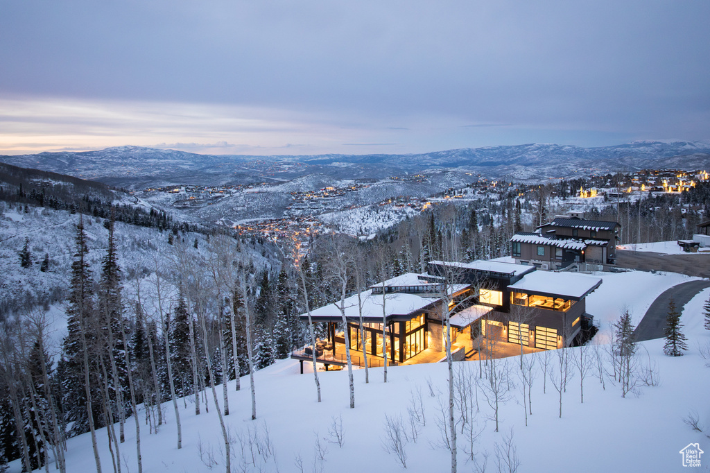 Snowy aerial view with a mountain view