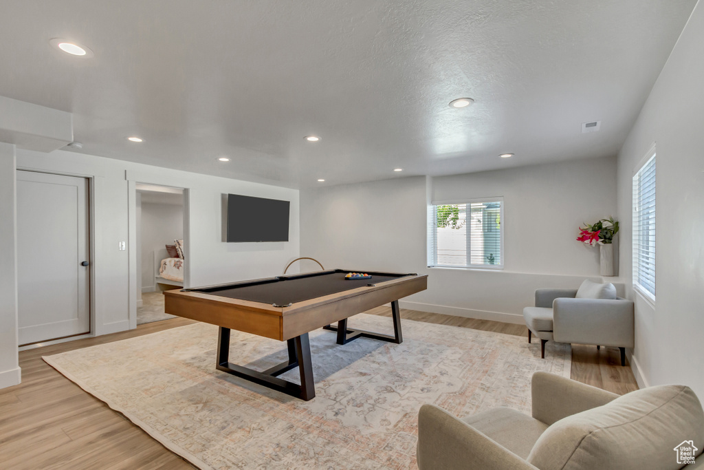 Rec room with light wood finished floors, billiards, recessed lighting, and baseboards