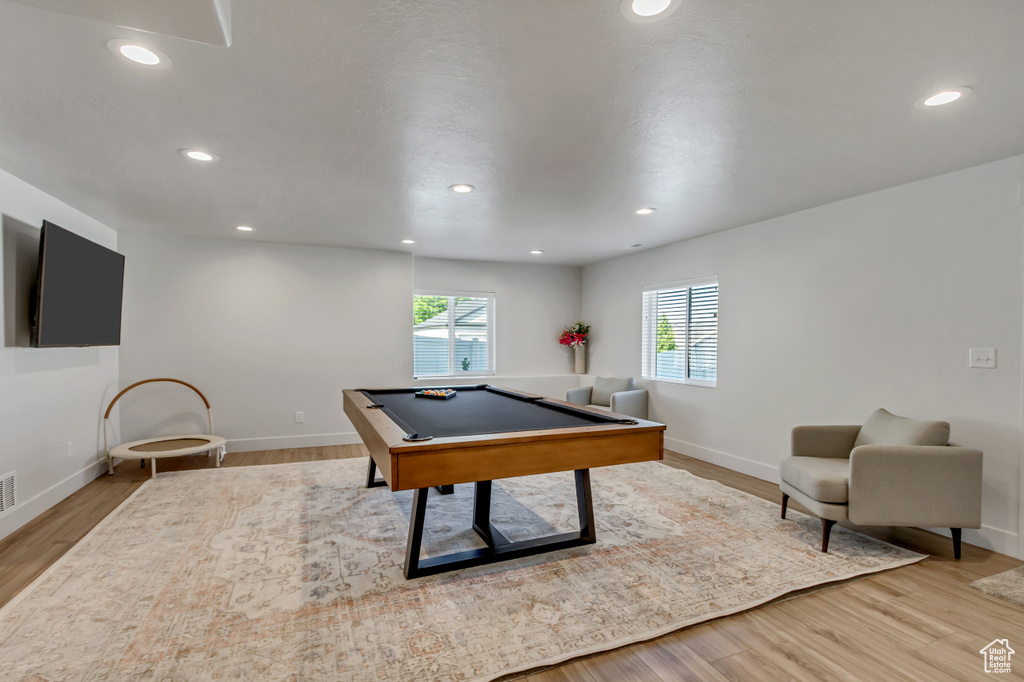 Rec room with billiards table, wood finished floors, baseboards, and recessed lighting