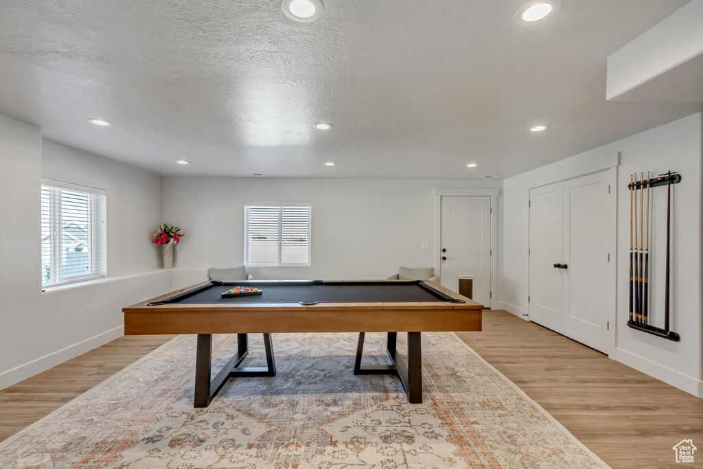 Rec room with billiards table, healthy amount of natural light, light wood-type flooring, recessed lighting, and baseboards