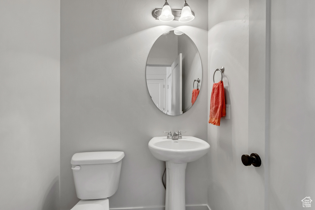 Bathroom with toilet and a sink
