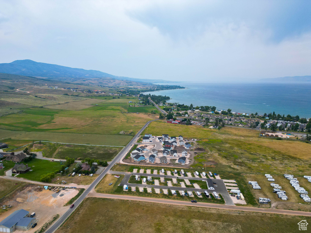 Aerial overview of property\'s location with a water and mountain view