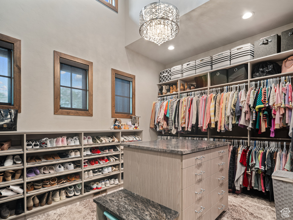 Spacious closet with a chandelier