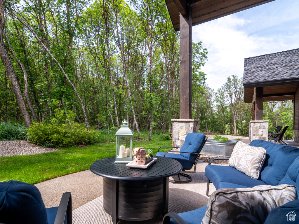 View of patio with an outdoor living space