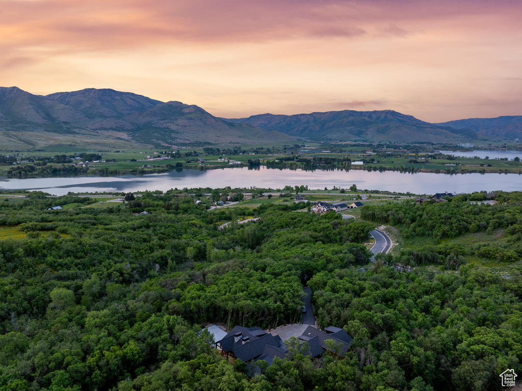 Mountain view featuring a nearby body of water